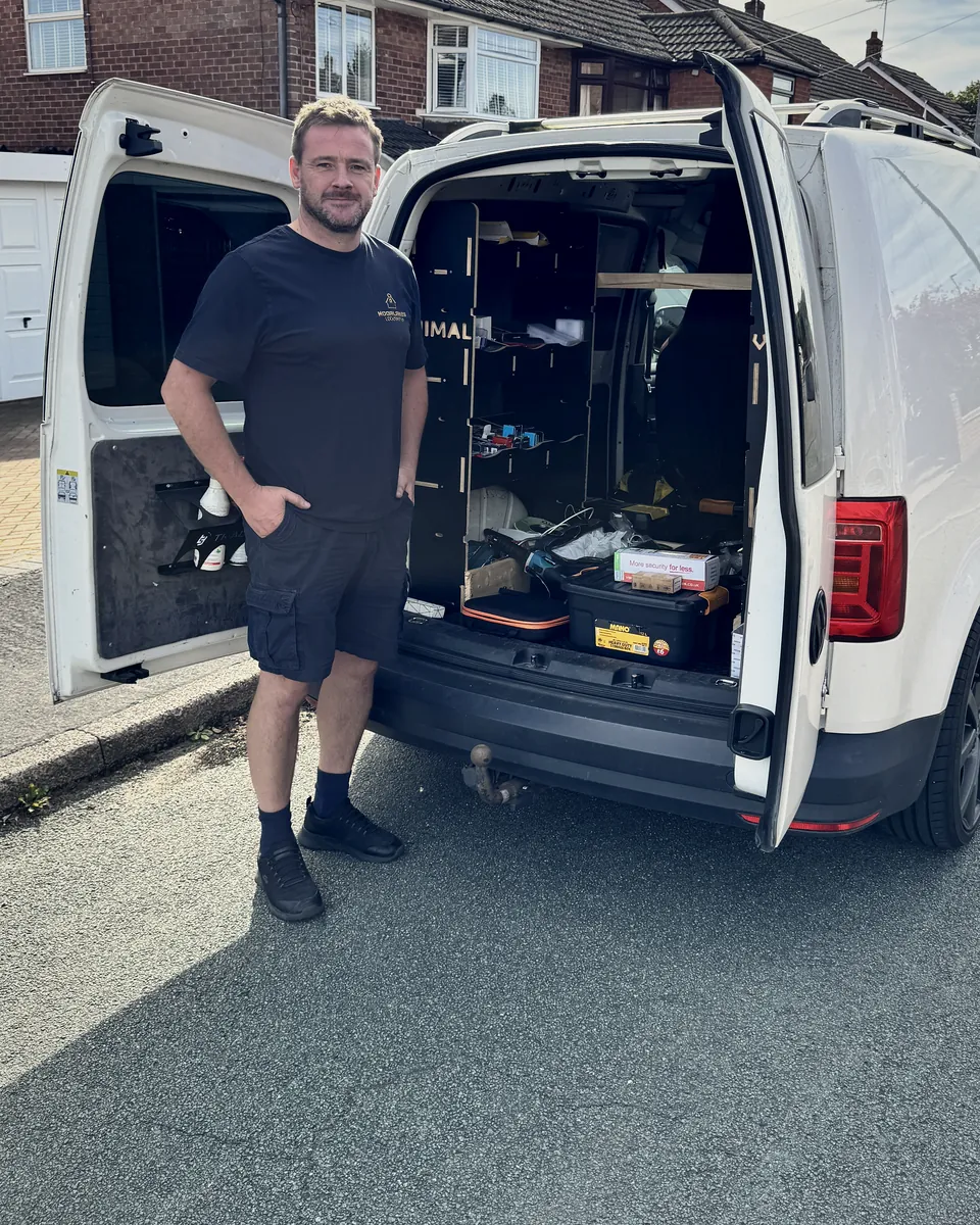 Brett at the open back of his van